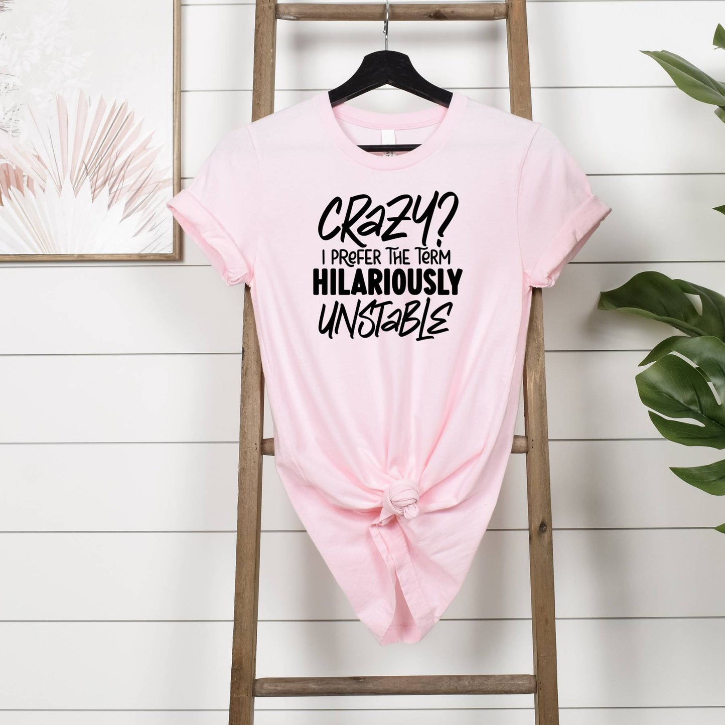 Crazy or Hilariously Unstable T-shirt Hanging in Pink 