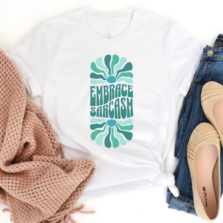 Embrace Sarcasm T-shirt flat lay in white 