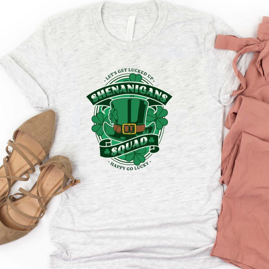 Shenanigans Squad T-Shirt with St. Patrick's Day themed green hat and shamrocks design on white tee