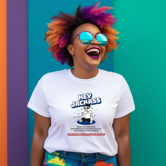 Person wearing colorful hair and reflective sunglasses with a white Hey Jackass T-shirt featuring bold graphic and text design against vibrant green and purple background