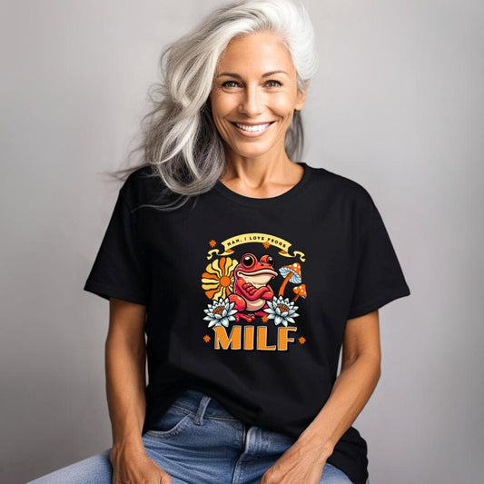 Woman wearing black "Man I Love Frogs" T-shirt with cartoon frog and floral design