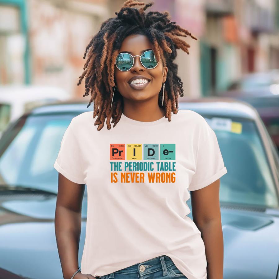 Woman wearing The Periodic Table Is Never Wrong T-Shirt with PRIDE spelled in periodic table style letters and text underneath