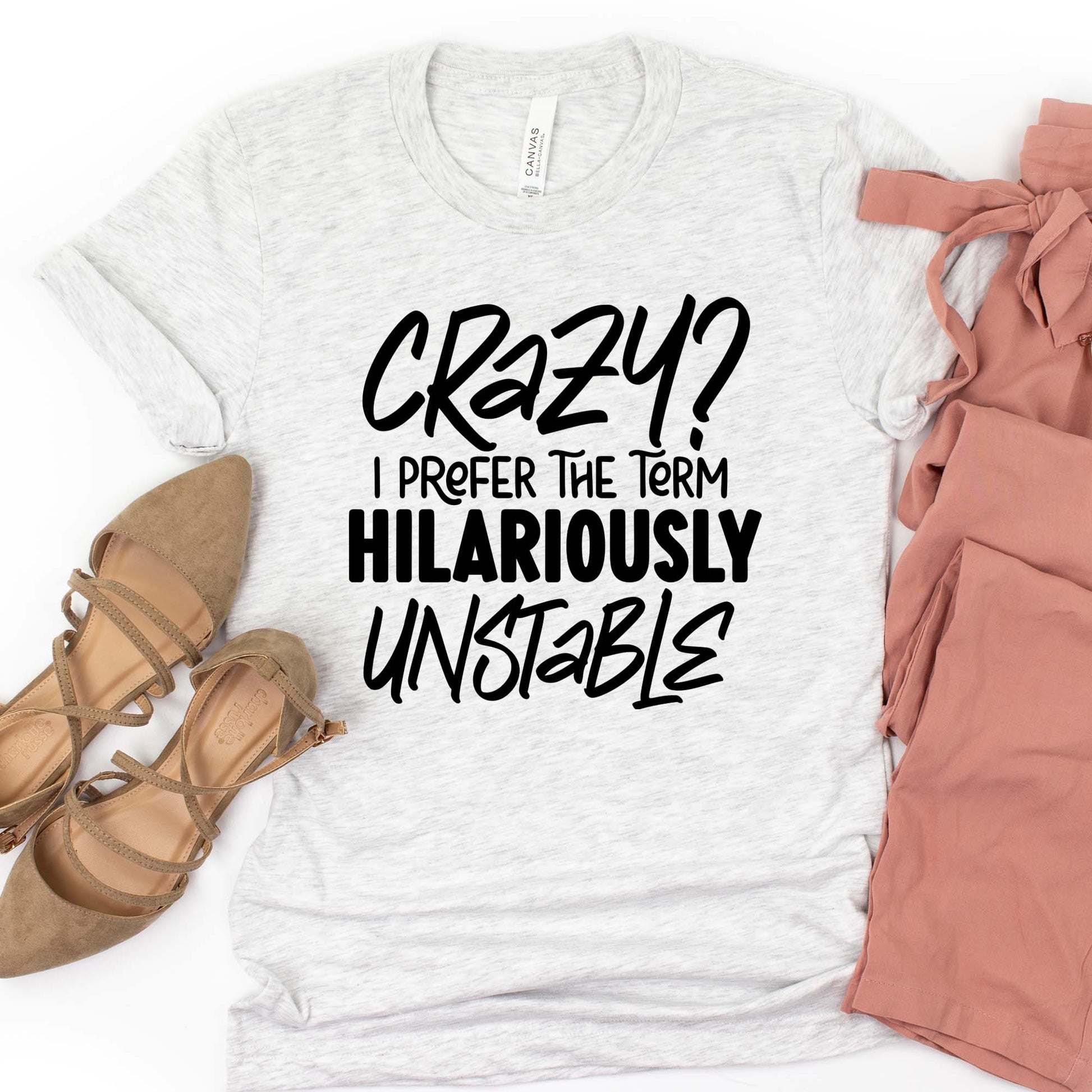 Crazy or Hilariously Unstable T-shirt Flat Lay in Ash 